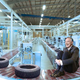 Illustration for article titled Tim Kaine Found Riding Conveyor Belt During Factory Campaign Stop
